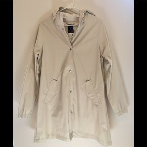 Cream raincoat brand new